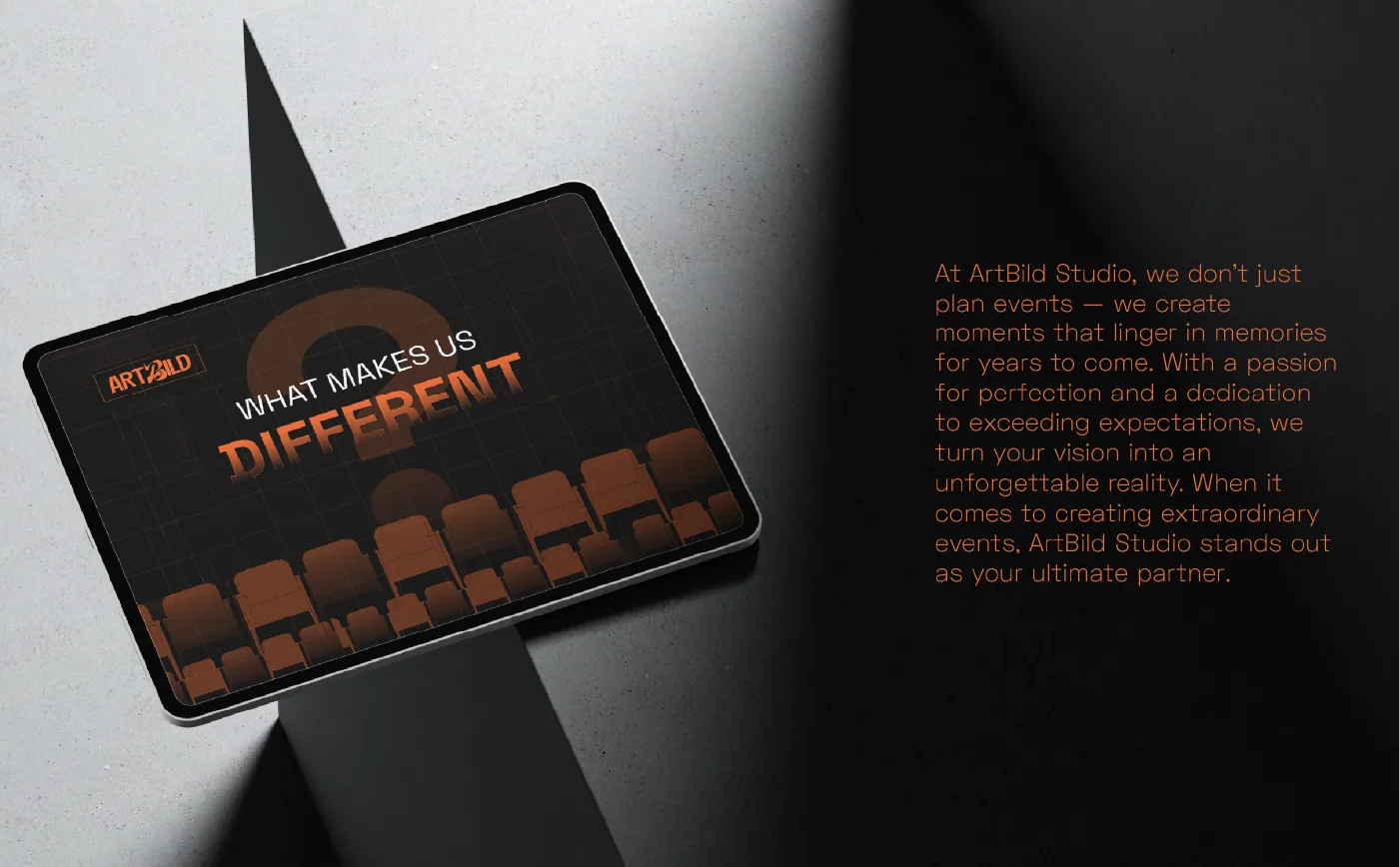 Tablet on a grey surface showing a dark Artbild presentation screen