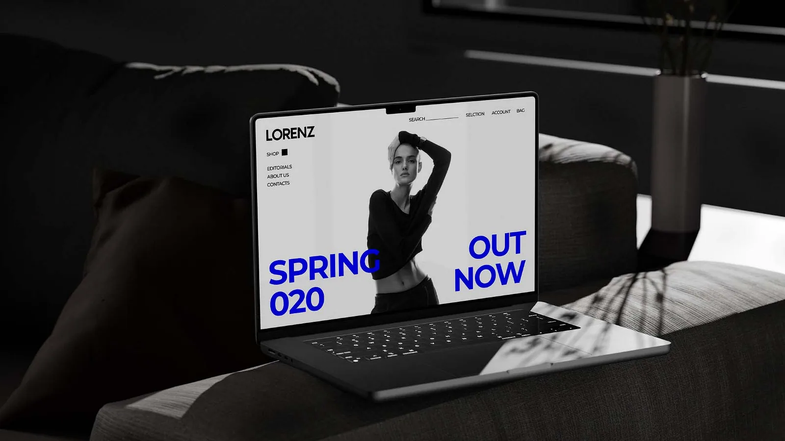 Laptop on a sofa showing the Lorenz spring campaign website