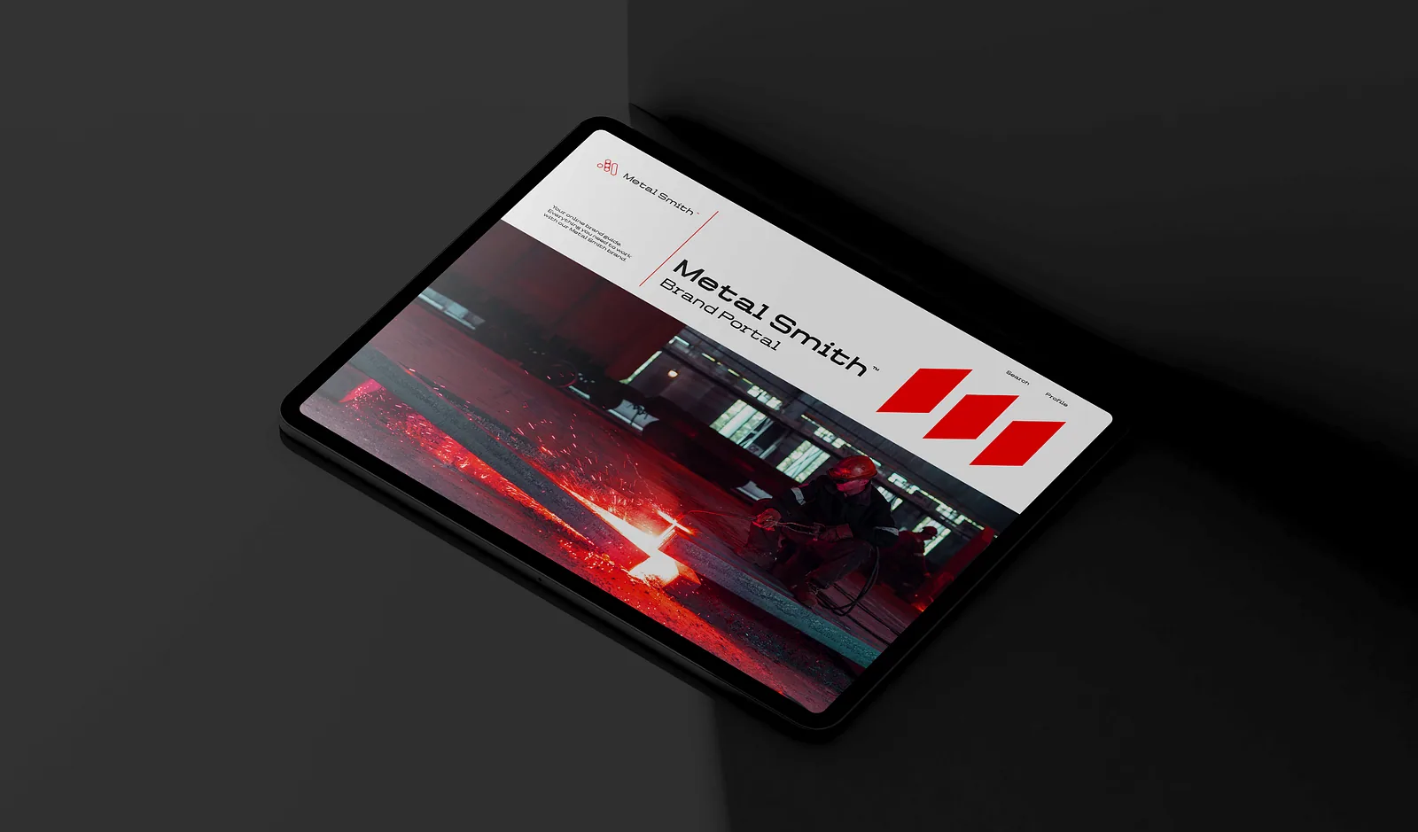 Tablet showing the Metal Smith website homepage on a dark surface