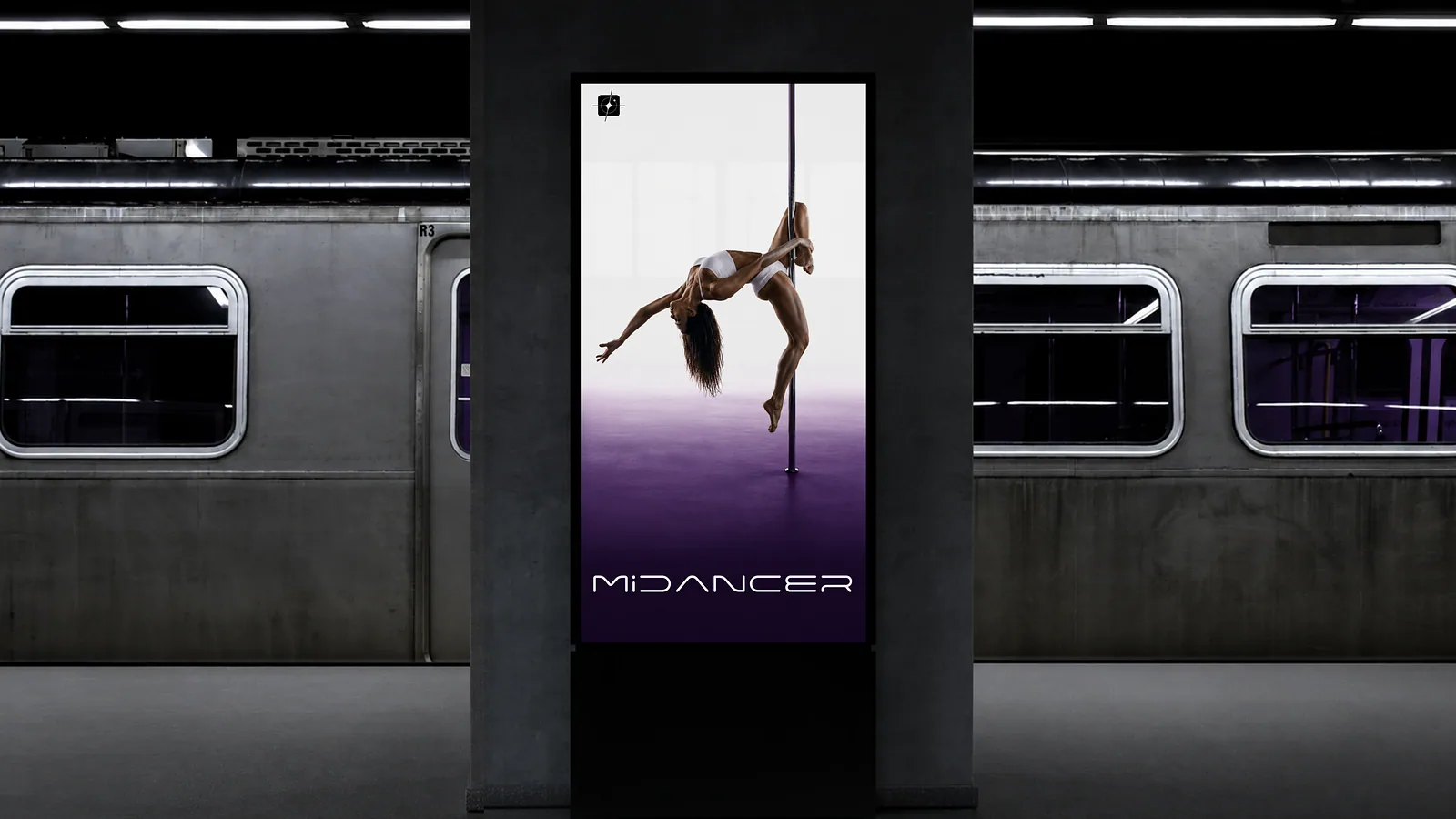 Digital poster of the MiDancer campaign on a subway platform screen