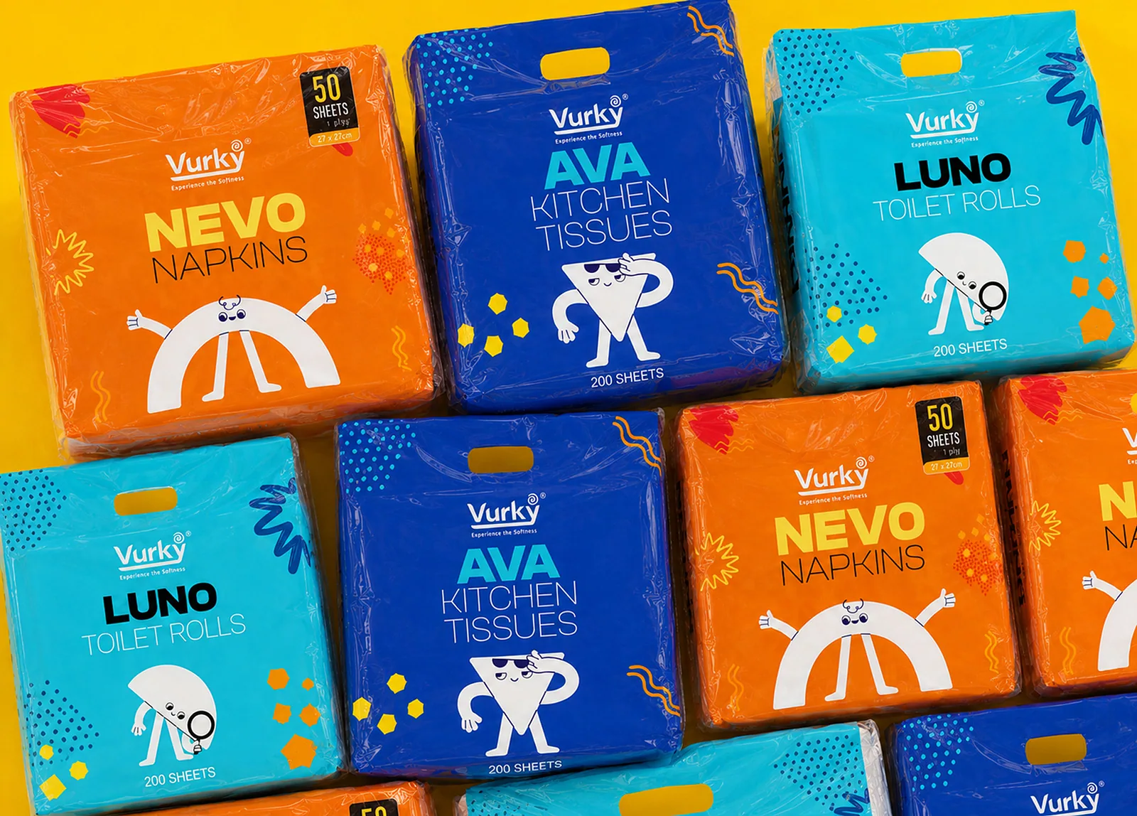 Nevo, Ava and Luno packs stacked together on a yellow ground